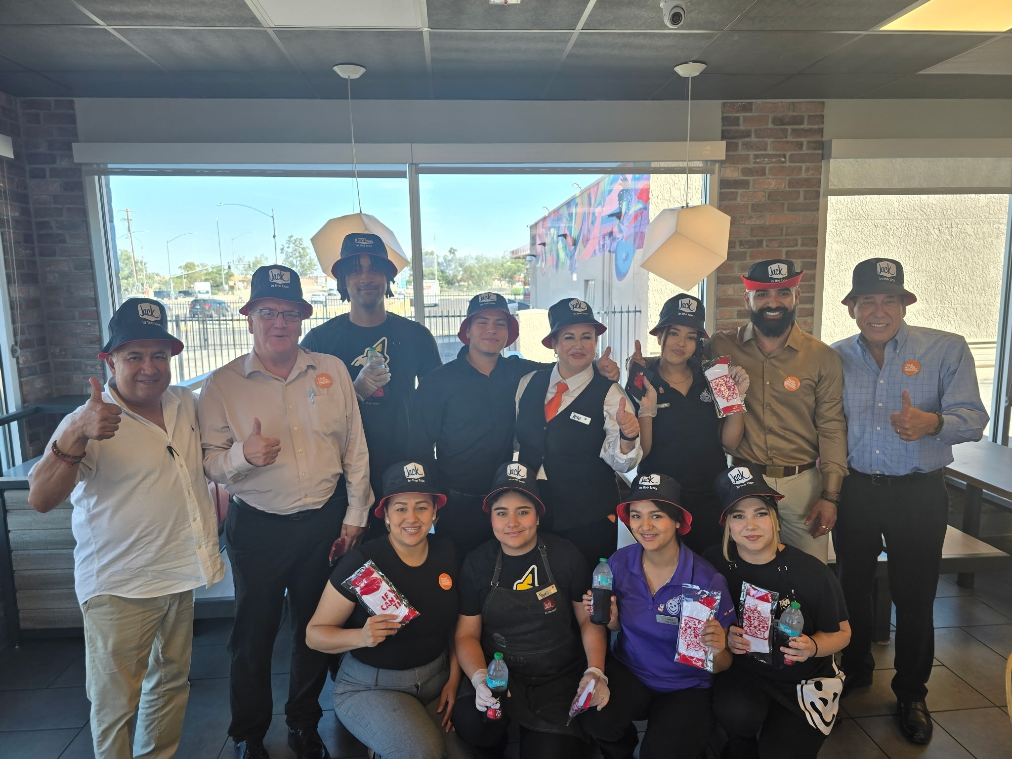 Restaurant team celebrating the No Kid Hungry campaign together